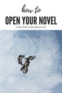 Man doing a stunt on a motorcycle | Open your novel with a scene that grabs readers attention. | Fiction Notes at DarcyPattison.com