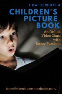 Boy in the dark looking at book. Write a Picture Book Course by Darcy Pattison | Mims House